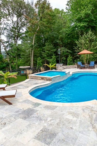Poolside Lounge with Silver Travertine Pavers – Luxury Backyard Hardscape